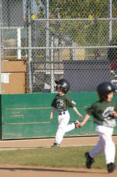 1st inning at bat - After picking up speed down first base line