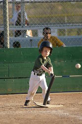3rd inning at bat - his strongest hit of the day... but right at the pitcher